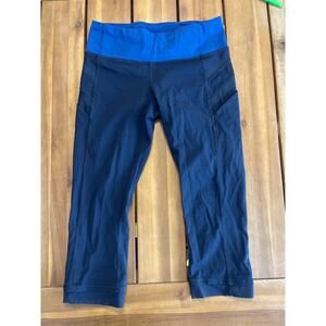 Lululemon Illumina Crop with side pockets Inkwell / Rugged Blue Size 6